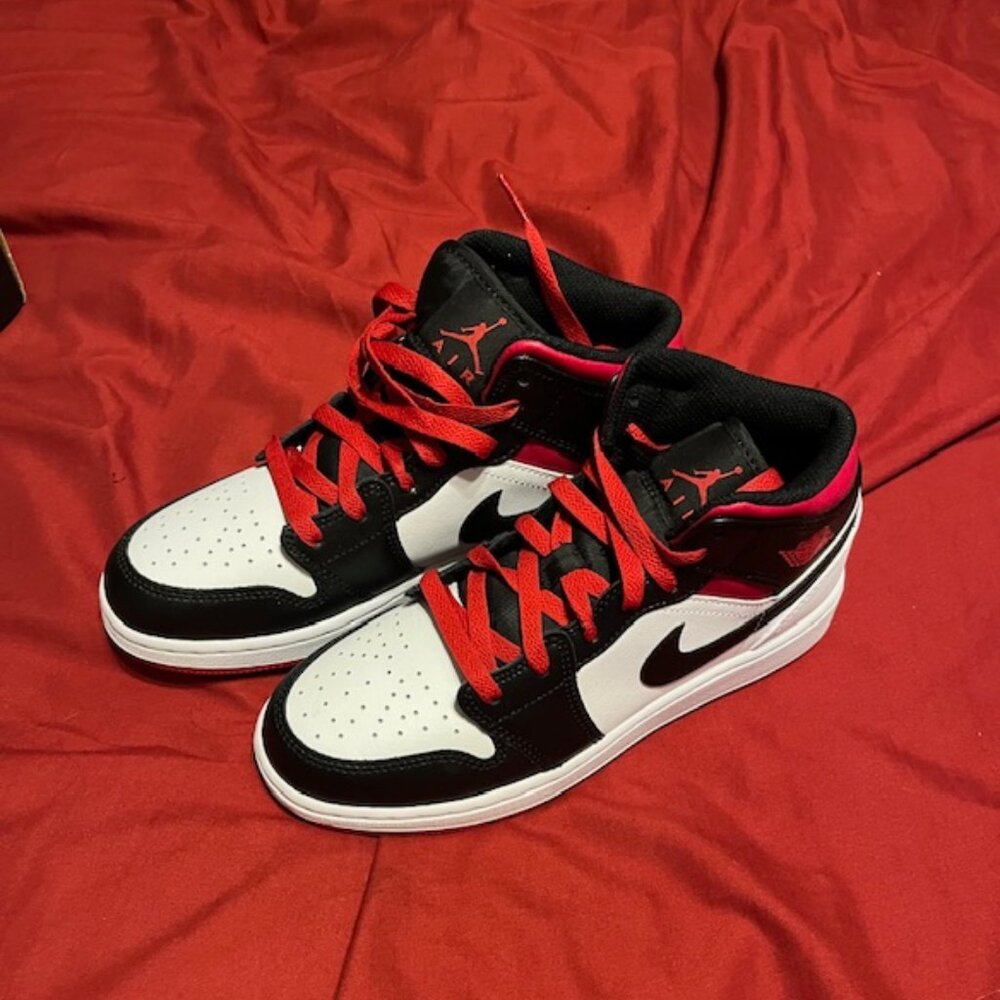 Big Kids Jordan Retro 1 Mid Black, Red, and White Sneakers